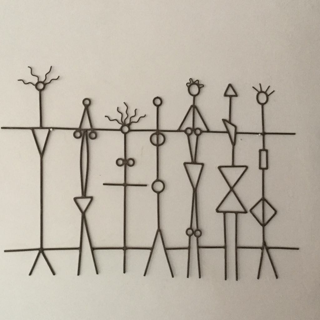 Elegant wire sculpture of abstract figures